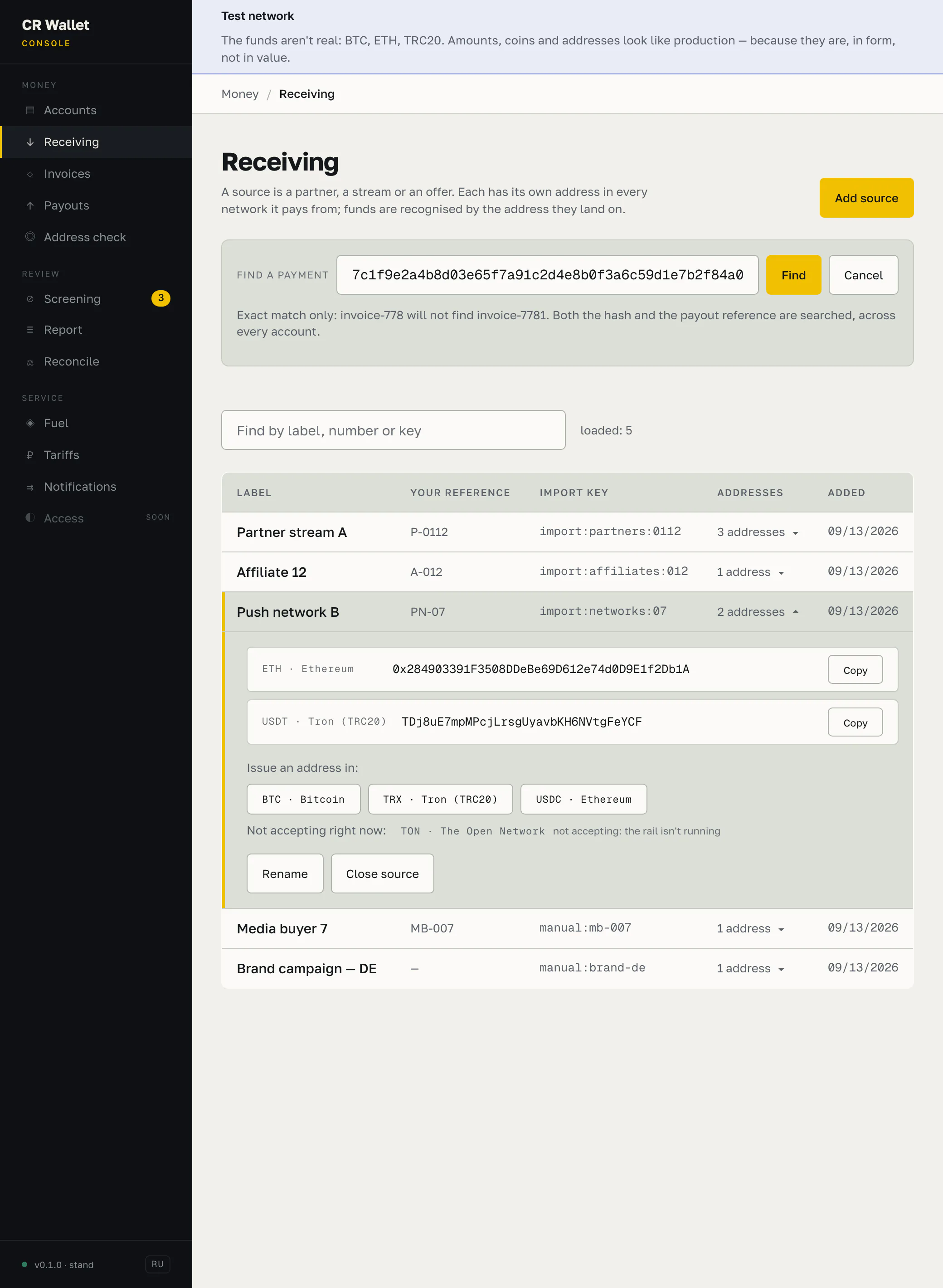 Receiving screen: a payment lookup with a hash filled in and a note that it matches exactly and will not guess; a table of five sources with label, own reference, import key, address count and date; one source expanded to show its full Ethereum and Tron addresses, each with a copy button, the networks it can still be issued an address in, and the one it is not accepting, with the reason. A banner at the top says the funds are not real.